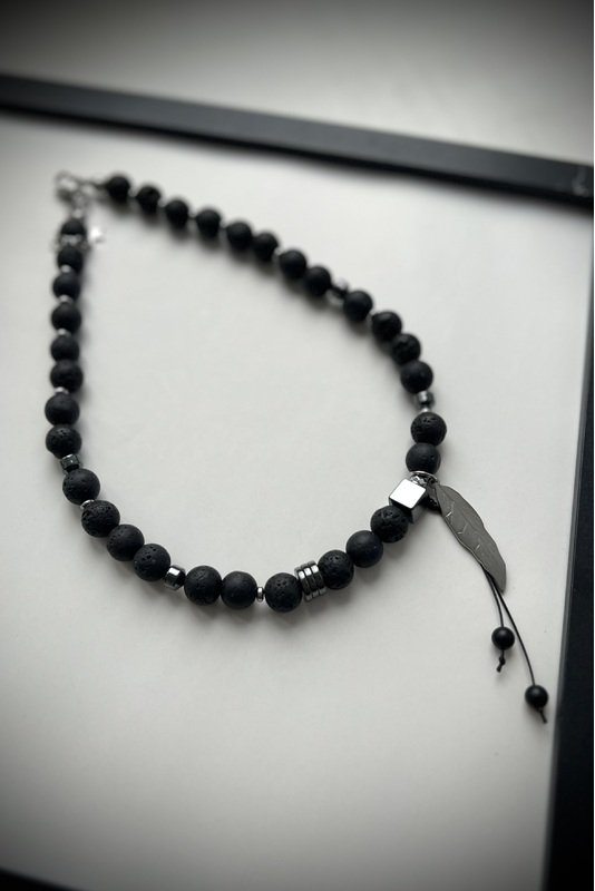 Lavos vėrinys su "plunksna"